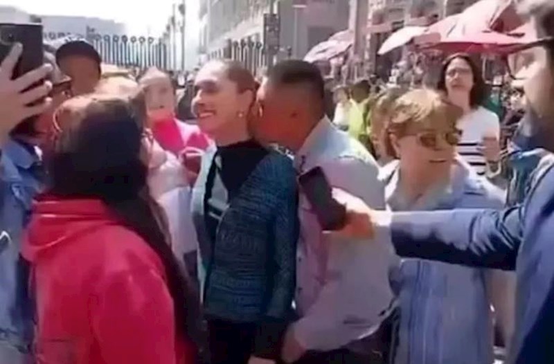 Küçənin ortasında prezidenti öpmək istədi – Video