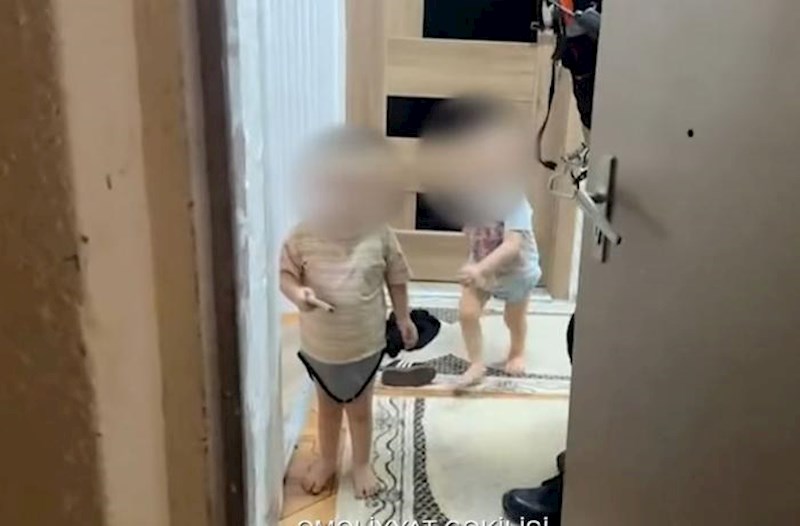 Bağlı qapı arxasında qalan azyaşlılar belə xilas edildi − Video